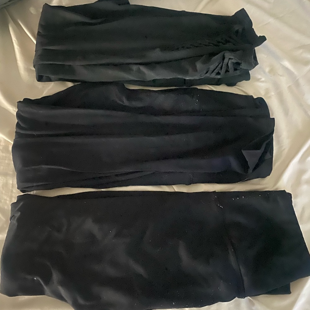 Three pairs of leggings! 2 size Smalls and one extra small. All color black